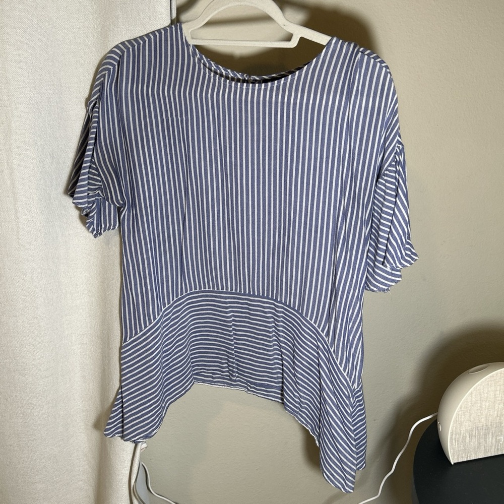 Striped blue and white blouse.